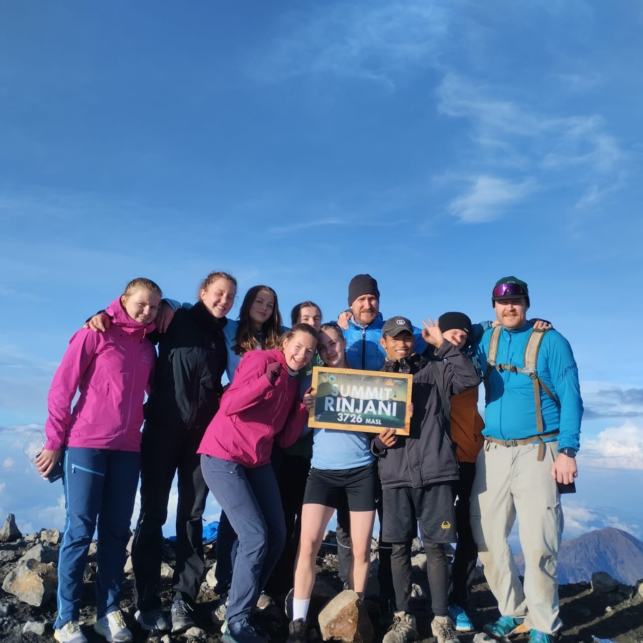 Trekker at sunrise Mount Rinjani summit